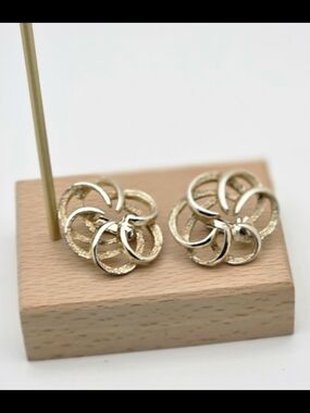 Vintage Sarah Coventry Gold Tone Textured Swirl Clip-On Earrings - Signed